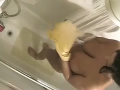 Seeing my gorgeous brunette breasts in the water while they wash